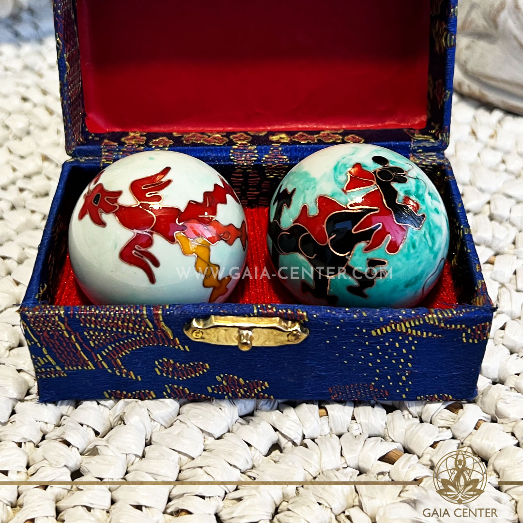Pair of Stress or Health Balls - Dragon and Phoenix metal design. These health balls have been used in Chinese medicine, in order to support the flexibility and blood circulation in hands and fingers. Wellbeing and feng shui products selection at Gaia Center Crystals & Incense shop in Cyprus. Order online, Cyprus islandwide delivery: Limassol, Paphos, Larnaca, Nicosia. Europe and worldwide shipping.