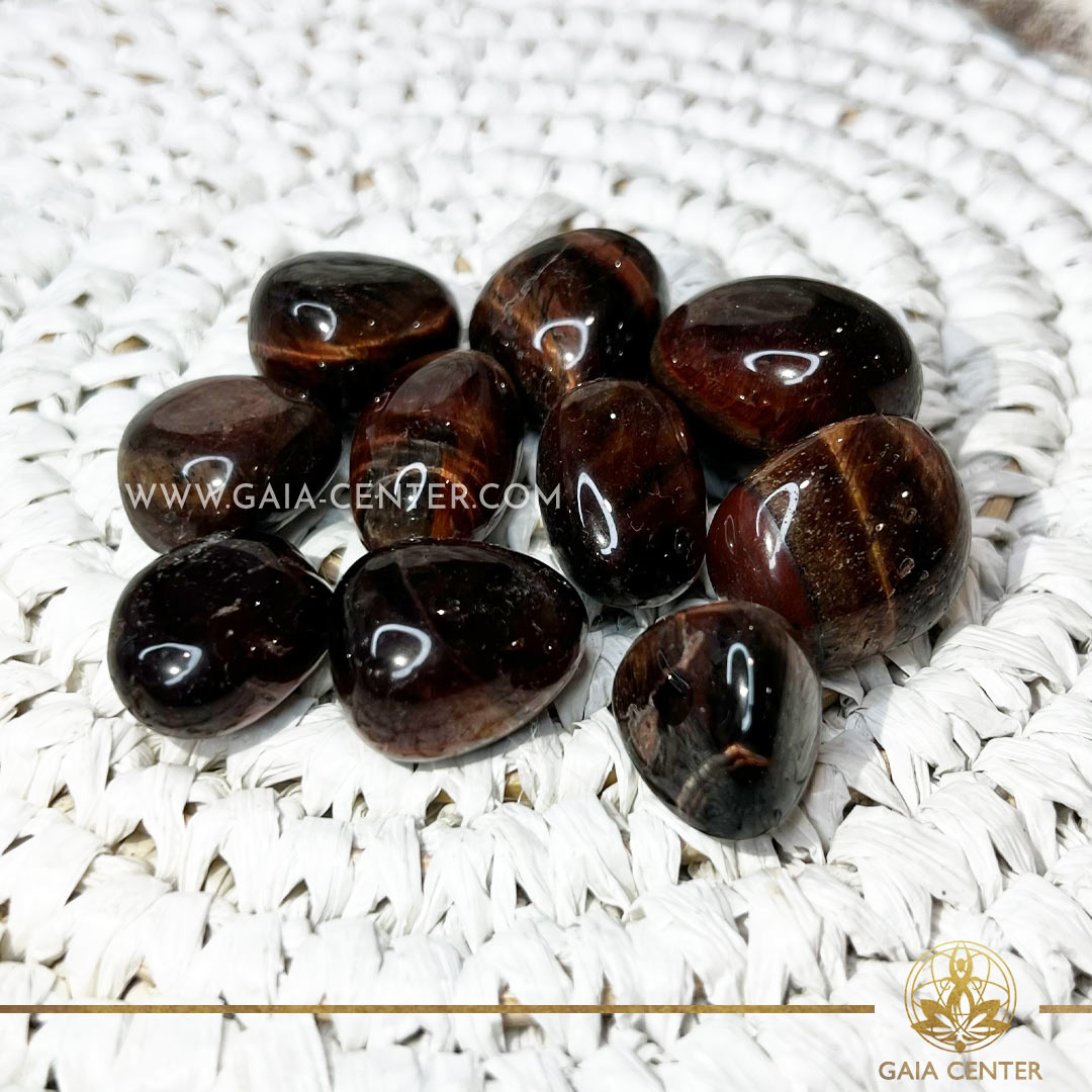 Red Tigers Eye Tumbled Stone |20-30mm| polished tumbled stones at Gaia Center crystal shop in Cyprus. Crystal tumbled stones and rough minerals, drusy at Gaia Center crystal shop in Cyprus. Order crystals online top quality crystals, Cyprus islandwide delivery: Limassol, Larnaca, Paphos, Nicosia. Europe and Worldwide shipping.