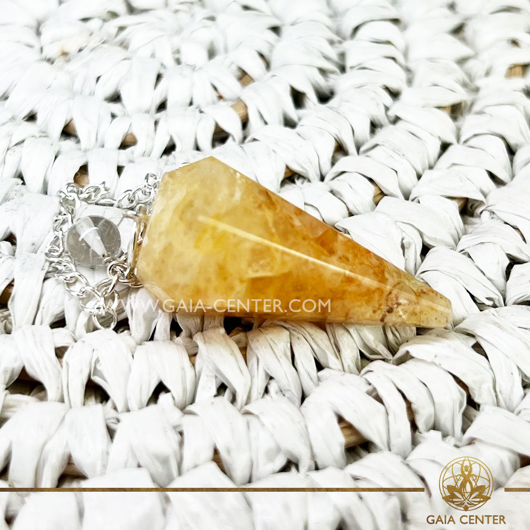 Pendulum for dowsing Golden Healer Quartz faceted cone with metal chain at Gaia Center Crystal shop in Cyprus. Crystal and Gemstone Jewellery Selection at Gaia Center in Cyprus. Order online, Cyprus islandwide delivery: Limassol, Larnaca, Paphos, Nicosia. Europe and Worldwide shipping.