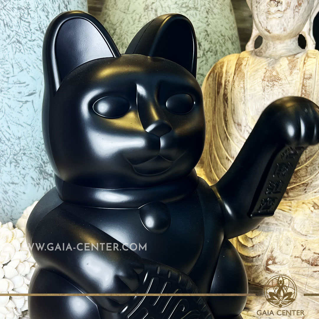 Feng Shui Japanese Waving Lucky Money Cat Large - Black Mat color 30cm with moving beckoning paw. Japanese Lucky Cat Maneki-Neko at Gaia Center Crystal Shop in Cyprus. Shop online, islandwide delivery: Limassol, Nicosia, Larnaca, Paphos.