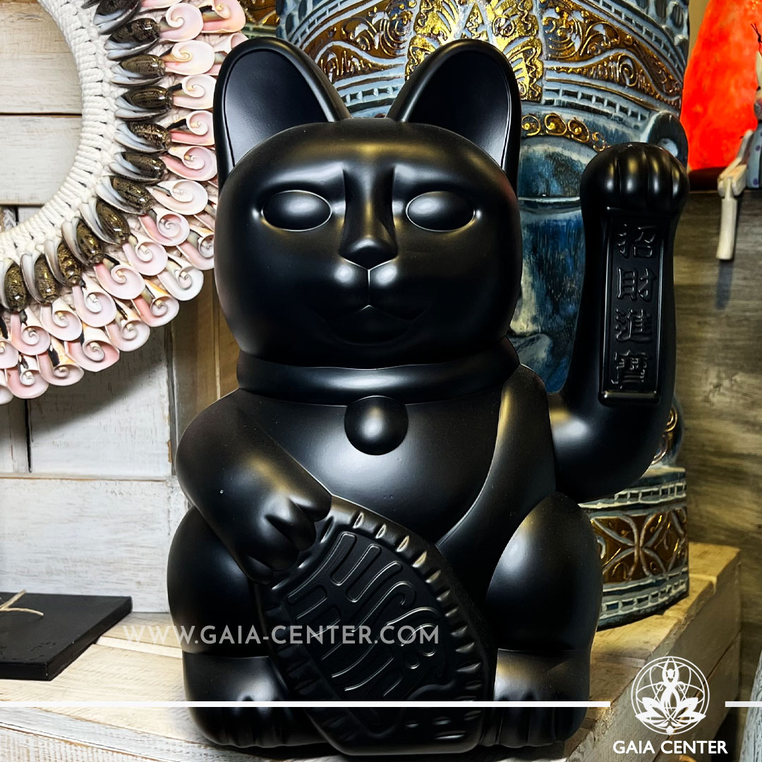 Feng Shui Japanese Waving Lucky Money Cat Large - Black Mat color 30cm with moving beckoning paw. Japanese Lucky Cat Maneki-Neko at Gaia Center Crystal Shop in Cyprus. Shop online, islandwide delivery: Limassol, Nicosia, Larnaca, Paphos.