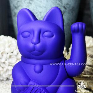 Feng Shui Japanese Waving Lucky Money Cat - Purple Mat color 15cm with moving beckoning paw. Maneki-Neko is a popular Japanese lucky charm and talisman. Available at Gaia Center Crystal Shop in Cyprus. Shop online, islandwide delivery: Limassol, Nicosia, Larnaca, Paphos.