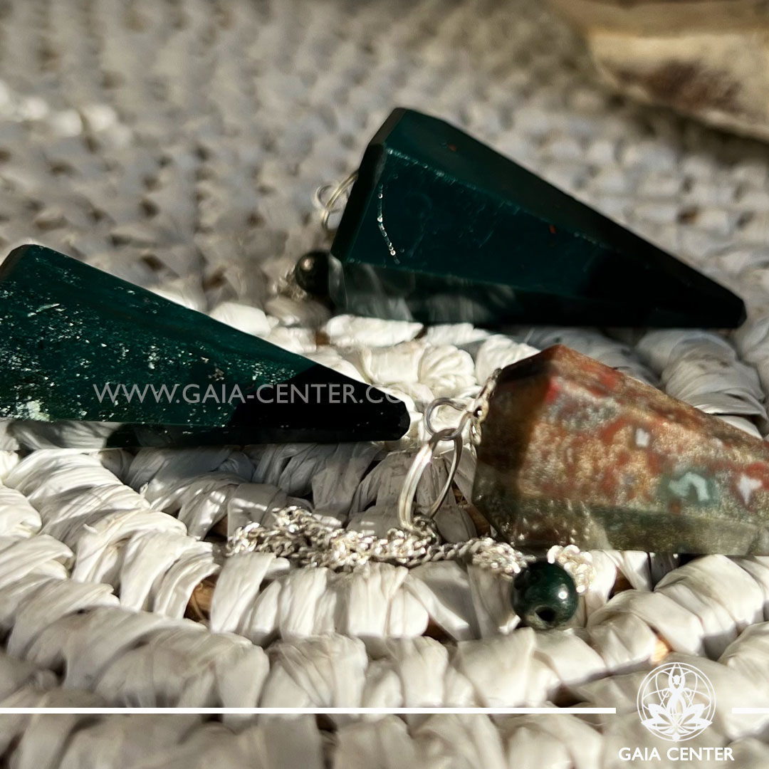 Crystal Pendulum for dowsing Bloodstone faceted cone with metal chain at Gaia Center Crystal shop in Cyprus. Crystal and Gemstone Jewellery Selection at Gaia Center in Cyprus. Order online, Cyprus islandwide delivery: Limassol, Larnaca, Paphos, Nicosia. Europe and Worldwide shipping.