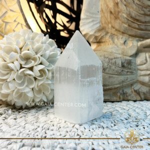 Selenite Pencil Point Tower |10cm| at Gaia Center Crystal shop in Cyprus. Crystal and Gemstone Jewellery Selection at Gaia Center in Cyprus. Order online, Cyprus islandwide delivery: Limassol, Larnaca, Paphos, Nicosia. Europe and Worldwide shipping.