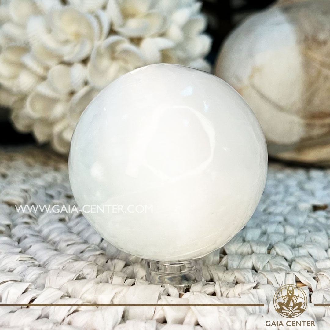Selenite Crystal Sphere |55mm| at Gaia Center Crystal shop in Cyprus. Crystal and Gemstone Jewellery Selection at Gaia Center in Cyprus. Order online, Cyprus islandwide delivery: Limassol, Larnaca, Paphos, Nicosia. Europe and Worldwide shipping.