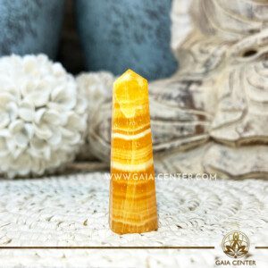 Crystal Obelisk polished point tower Yellow Fluorite. Crystal points, towers and obelisks selection at Gaia Center Crystal Shop in Cyprus. Order online, Cyprus islandwide delivery: Limassol, Larnaca, Paphos, Nicosia. Europe and Worldwide shipping.