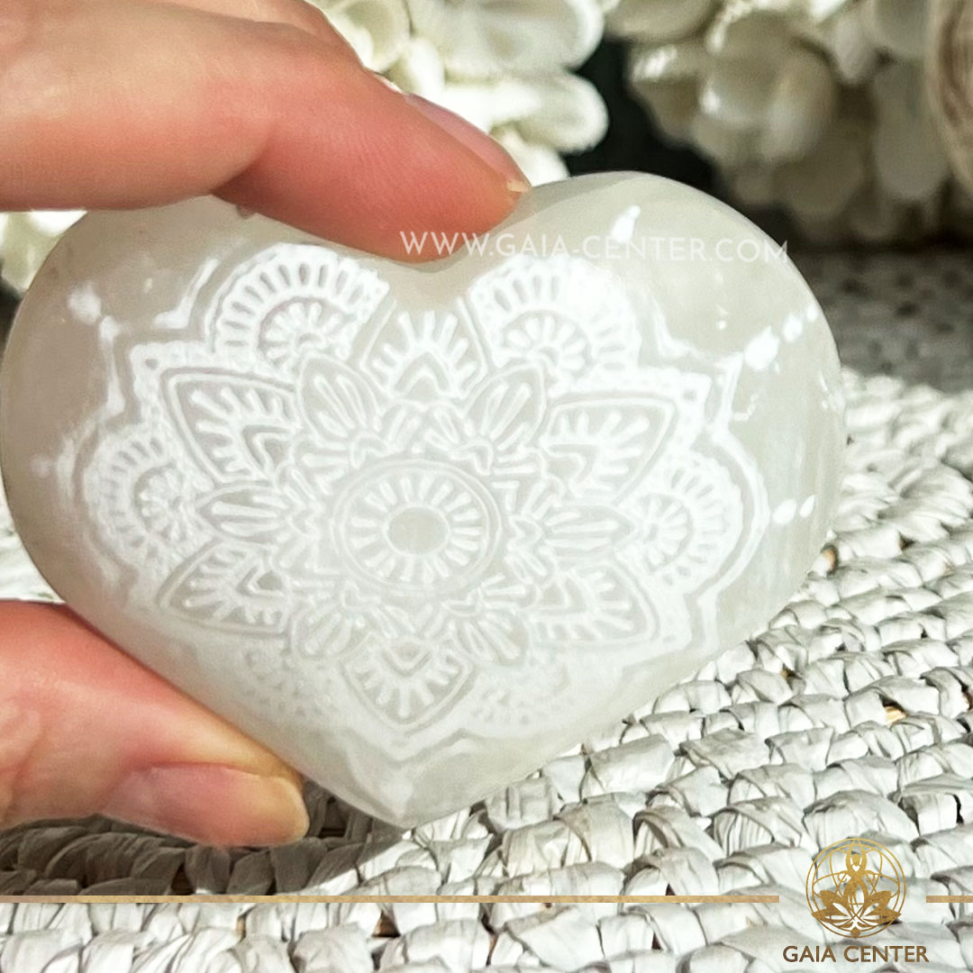 White Selenite crystal polished puff heart with mandala engraved from Morocco at Gaia Center crystal shop in Cyprus. Crystal tumbled stones and rough minerals, drusy at Gaia Center crystal shop in Cyprus. Order crystals online top quality crystals, Cyprus islandwide delivery: Limassol, Larnaca, Paphos, Nicosia. Europe and Worldwide shipping.