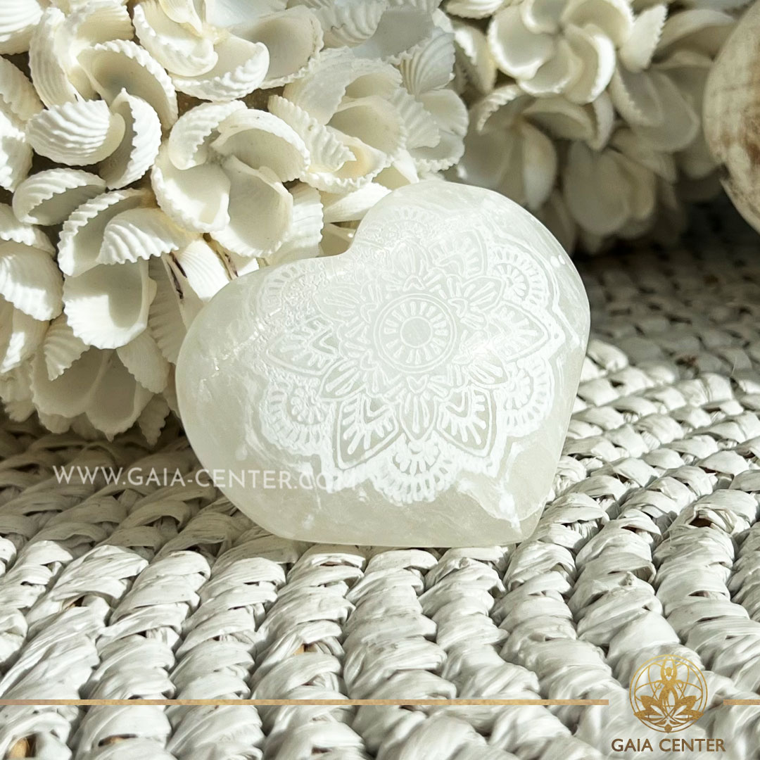 White Selenite crystal polished puff heart with mandala engraved from Morocco at Gaia Center crystal shop in Cyprus. Crystal tumbled stones and rough minerals, drusy at Gaia Center crystal shop in Cyprus. Order crystals online top quality crystals, Cyprus islandwide delivery: Limassol, Larnaca, Paphos, Nicosia. Europe and Worldwide shipping.