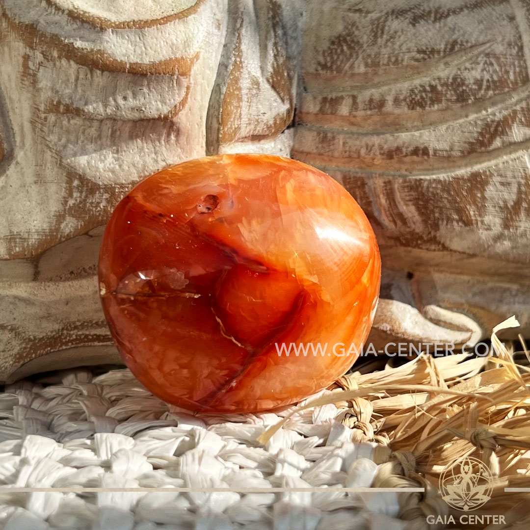 Carnelian Palm Stone |45-50x40mm /50-60g| Madagascar at GAIA CENTER Crystal Shop in CYPRUS. Crystal jewellery and crystal pendants at Gaia Center crystal shop in Cyprus. Order online top quality crystals, Cyprus islandwide delivery: Limassol, Larnaca, Paphos, Nicosia. Europe and Worldwide shipping.