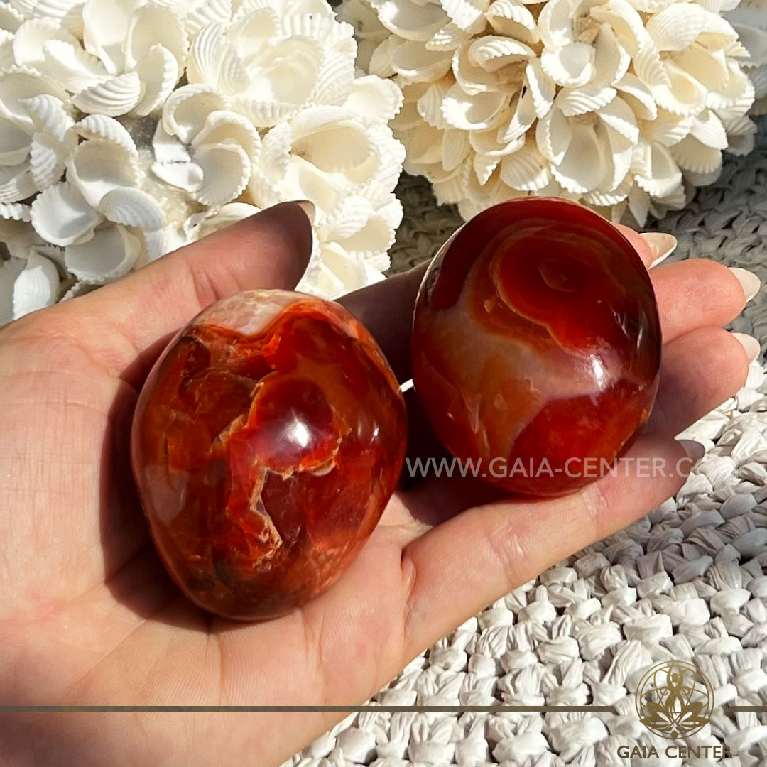 Carnelian Palm Stone Large |60x45mm /95-125g| Madagascar at GAIA CENTER Crystal Shop in CYPRUS. Crystal jewellery and crystal pendants at Gaia Center crystal shop in Cyprus. Order online top quality crystals, Cyprus islandwide delivery: Limassol, Larnaca, Paphos, Nicosia. Europe and Worldwide shipping.
