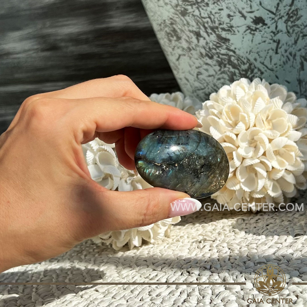 Labradorite Palm Stone |50-60x40mm /50g| Madagascar at GAIA CENTER Crystal Shop in CYPRUS. Crystal jewellery and crystal pendants at Gaia Center crystal shop in Cyprus. Order online top quality crystals, Cyprus islandwide delivery: Limassol, Larnaca, Paphos, Nicosia. Europe and Worldwide shipping.
