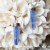 Blue Kyanite crystal earrings in a Rough shape with sterling silver setting from Brazil at Gaia Center Crystal shop in Cyprus. As you wear the Blue Kyanite Crystal earrings, actively embrace its calming properties. It actively invites tranquility into your life, making it an ideal accessory for those seeking inner peace and balance amidst life's challenges. Order crystals online, Cyprus islandwide delivery: Limassol, Larnaca, Paphos, Nicosia. Europe and Worldwide shipping.