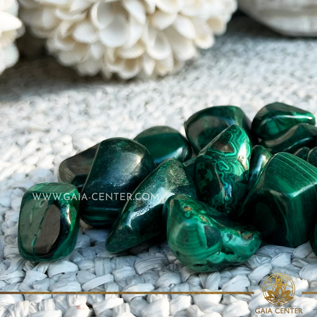 Malachite green Polished Tumbled stone at GAIA CENTER | Crystal Shop in Cyprus. Malachite is known for promoting emotional healing, enhancing intuition, and providing protection. Explore the holistic benefits of these polished tumbled stones in meditation, energy work, or as a beautiful addition to your crystal collection. Selection of top quality crystals available at our crystal shop in Cyprus. Cyprus islandwide delivery: Limassol, Paphos, Larnaca, Nicosia