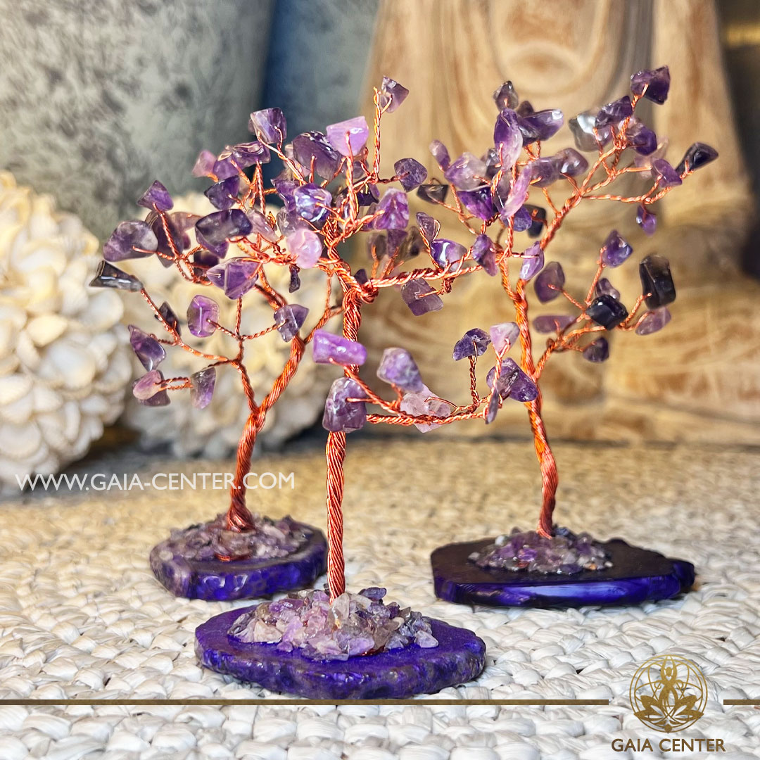 Amethyst Crystal Tree with Purple Agate Base |35 stones| at Gaia Center Crystal shop in Cyprus. Amethyst is associated with calming and balancing energies. The presence of this crystal in tree form, rooted in a Purple Agate base, may create a tranquil environment, aiding in stress relief and emotional equilibrium. Order crystals online, Cyprus islandwide delivery: Limassol, Larnaca, Paphos, Nicosia. Europe and Worldwide shipping.