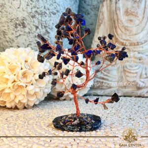 Blue Agate Base Sodalite Gemstone Tree |100 stones| at Gaia Center Crystal shop in Cyprus. Immerse yourself in the tranquil energy and clarity offered by the Blue Agate Base Sodalite Crystal Tree, a harmonious combination that brings together the calming properties of agate and the insightful energy of sodalite. Order crystals online, Cyprus islandwide delivery: Limassol, Larnaca, Paphos, Nicosia. Europe and Worldwide shipping.
