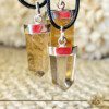 Yellow Citrine Polished Point Pendant from Brazil at GAIA CENTER Crystal Shop in CYPRUS. Yellow Citrine is renowned for attracting abundance and prosperity. Wear this pendant to invite positive energy and financial well-being into your life. The sunny yellow hue of this polished citrine point pendant radiates warmth and joy. Embrace the uplifting energy reminiscent of a sunlit day. Crystal and Gemstone Jewellery Selection at Gaia Center Crystal shop in Cyprus. Order online, Cyprus islandwide delivery: Limassol, Larnaca, Paphos, Nicosia. Europe and Worldwide shipping.