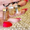 Yellow Citrine Polished Point Pendant from Brazil at GAIA CENTER Crystal Shop in CYPRUS. Yellow Citrine is renowned for attracting abundance and prosperity. Wear this pendant to invite positive energy and financial well-being into your life. The sunny yellow hue of this polished citrine point pendant radiates warmth and joy. Embrace the uplifting energy reminiscent of a sunlit day. Crystal and Gemstone Jewellery Selection at Gaia Center Crystal shop in Cyprus. Order online, Cyprus islandwide delivery: Limassol, Larnaca, Paphos, Nicosia. Europe and Worldwide shipping.