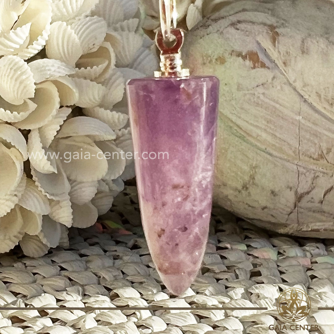Amethyst crystal pendant in a polished point shape at Gaia Center Crystal shop in Cyprus. Amethyst is renowned for its soothing properties, promoting a sense of calm and tranquility. Wear this pendant to experience a serene and balanced state of mind. Order crystals online, Cyprus islandwide delivery: Limassol, Larnaca, Paphos, Nicosia. Europe and Worldwide shipping.