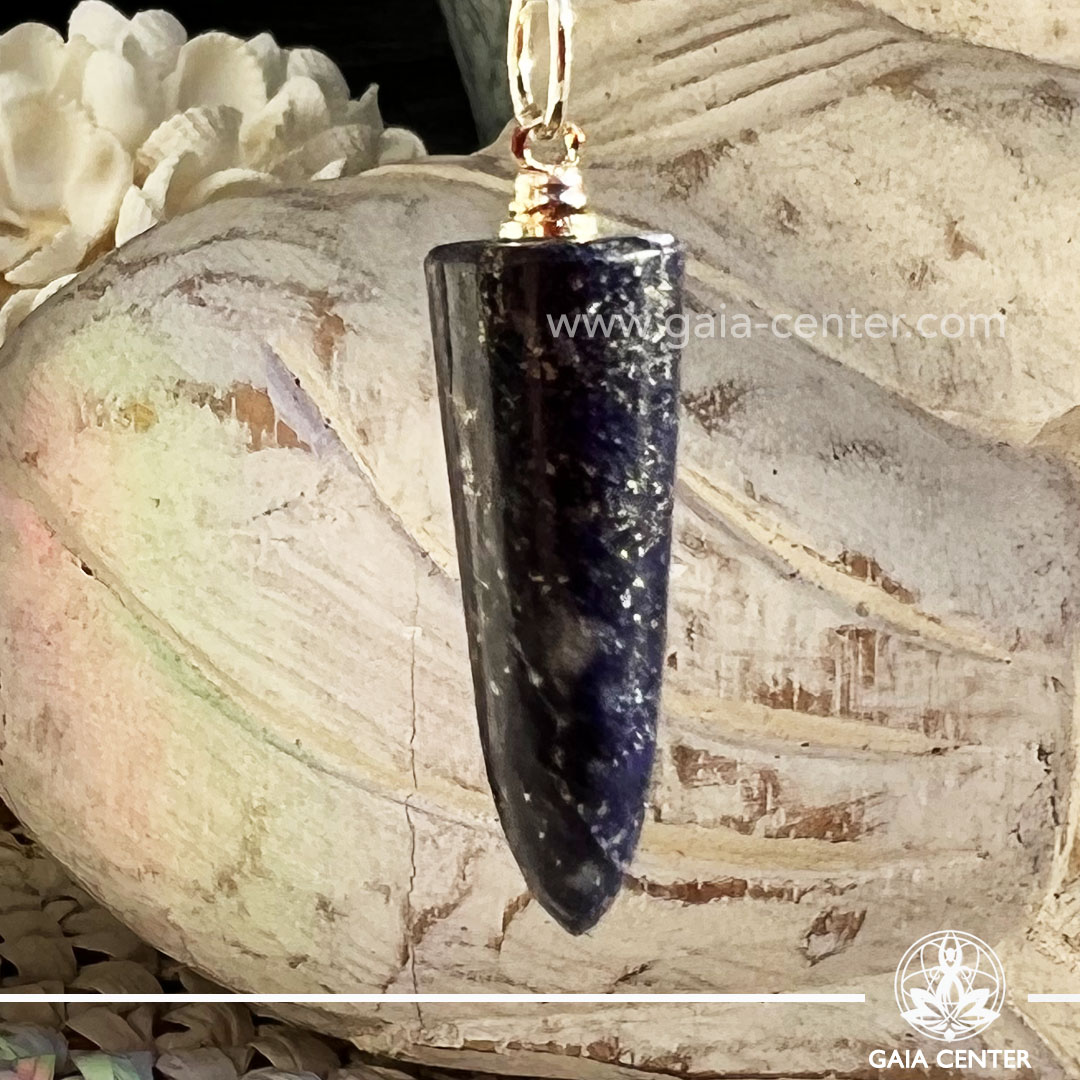 Blue Lapis Lazuli Polished Point Pendant at Gaia Center Crystal shop in Cyprus. Lapis Lazuli is a stone of inspiration. Promotes self-awarenessIncreases intuition and other psychic gifts. Enhances wisdom and truth. Order crystals online, Cyprus islandwide delivery: Limassol, Larnaca, Paphos, Nicosia. Europe and Worldwide shipping.