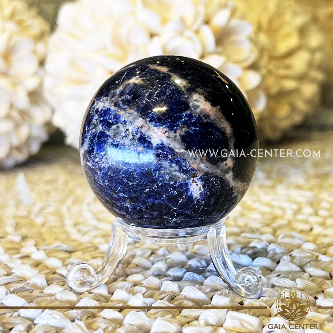 Blue Sodalite Crystal Polished Sphere |50-60mm/170g| at GAIA CENTER Crystal Shop in Cyprus. Blue Sodalite resonates with the throat chakra, supporting open and honest communication. The polished sphere's influence on this energy center may encourage self-expression and the articulation of thoughts and feelings. Order online top quality crystals, Cyprus islandwide delivery: Limassol, Larnaca, Paphos, Nicosia. Europe and Worldwide shipping.