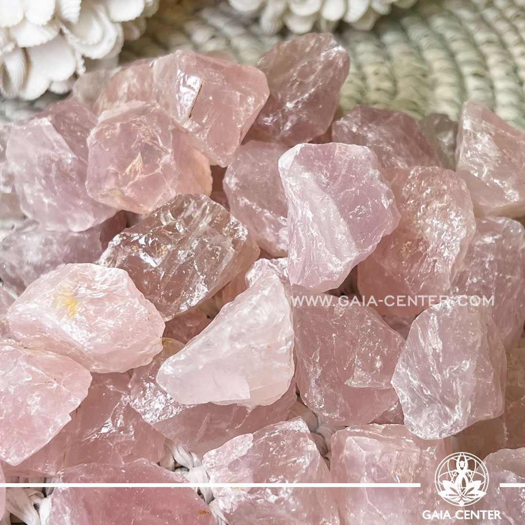 Pink Rose Quartz Rough natural unpolished crystal quartz clusters from Madagascar at GAIA CENTER Crystal shop in Cyprus. Rose Quartz purifies and opens the heart at all levels to promote love, self-love, friendship, deep inner healing and feelings of peace. Rose quartz promotes gentleness and love and stimulates positive emotional interactions, how to love oneself (again) as well as others. Crystal tumbled stones and rough minerals, drusy at Gaia Center crystal shop in Cyprus. Order crystals online top quality crystals, Cyprus islandwide delivery: Limassol, Larnaca, Paphos, Nicosia. Europe and Worldwide shipping.