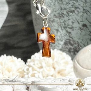 Honey Amber Cross Pendant | S925 Sterling Silver at GAIA CENTER Crystal Shop in Cyprus. Crystal and Gemstone Jewellery Selection at Gaia Center Crystal shop in Cyprus. Order online, Cyprus islandwide delivery: Limassol, Larnaca, Paphos, Nicosia. Europe and Worldwide shipping.
