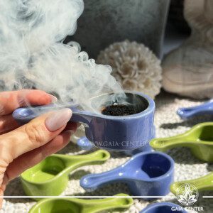 Palo Santo and Smudge Boms Burner | Blue at GAIA CENTER Crystal shop in Cyprus. Ceramic Burner for Palo Santo Wood, Herbs, Aromatic Resins, and Smudge Bombs Enhance your home ambiance with our premium Ceramic Burner, expertly designed for burning Palo Santo wood, herbs, aromatic resins, and smudge bombs. Crafted from high-quality ceramic, this burner ensures even heat distribution, maximizing the release of soothing aromas. Its elegant design seamlessly blends with any decor, while its durable construction promises long-lasting use. Perfect for meditation, relaxation, and purifying spaces, our Ceramic Burner is an essential addition to your wellness routine. Experience tranquility and invite positive energy into your home today.