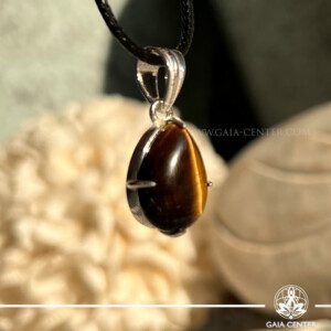 Golden Tiger's Eye Crystal Pendant TearDrop with S925 Sterling Silver at Gaia Center Crystal shop in Cyprus. Explore the powerful energies of our Golden Tiger's Eye Pendant, exclusively available at Gaia Center Crystal Shop in Cyprus. This stunning piece not only adds a touch of elegance to your style but also promotes clarity, protection, and confidence. Perfect for those seeking balance and a boost in their personal power.