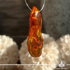 Natural Amber Freeform Pendant at Gaia Center Crystal shop in Cyprus. Amber is believed to carry soothing energies that promote emotional balance and energetic harmony. Crystal and Gemstone Jewellery Selection at Gaia Center in Cyprus. Order online, Cyprus islandwide delivery: Limassol, Larnaca, Paphos, Nicosia. Europe and Worldwide shipping.