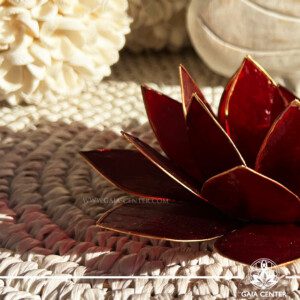 Lotus Flower Candle Holder - Red Gold Trim |Capiz Shell| at GAIA CENTER crystal store in Cyprus. Enhance your home décor with our exquisite Lotus Flower Candle Holder made from genuine Capiz Shell. This stunning piece combines natural elegance with artisanal craftsmanship, featuring a delicate lotus design that glows beautifully when lit. Perfect for creating a serene ambiance, this candle holder is ideal for meditation spaces, living rooms, or as a unique gift. Discover the timeless beauty of Capiz shell and add a touch of serenity and sophistication to any setting.