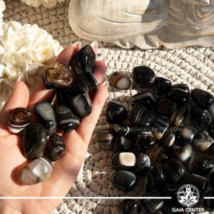 Black Banded Agate Tumblestone Brazil |30-40mm| at Gaia Center Crystal shop in Cyprus. Banded Agate, a powerful stone known for its grounding and protective properties. Order and buy crystals online, Cyprus islandwide delivery: Limassol, Larnaca, Paphos, Nicosia. Europe and Worldwide shipping.