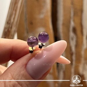 Amethyst Earrings Round at GAIA CENTER - Crystal Store Cyprus | In-Store & Online Discover exquisite Amethyst Earrings at GAIA CENTER Crystal Store in Cyprus. Shop in-store or online for these stunning pieces, known for their calming and protective properties. Perfect for enhancing spiritual awareness, reducing stress, and promoting balance.  Explore our collection today and experience the healing benefits of Amethyst.