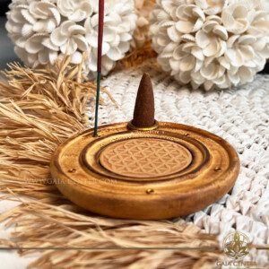 Incense Holder Mango Wood Round Ash Catcher - Flower of Life. Holds five aroma incense sticks and one incense pyramids or cone. Made from wood with artistic design. Incense burners selection at Gaia Center Crystal Incense Shop in Cyprus. Order online, Cyprus islandwide delivery: Limassol, Larnaca, Nicosia, Paphos. Europe and worldwide shipping.