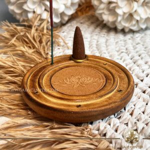 Incense Holder Mango Wood Round Ash Catcher - Lotus. Holds five aroma incense sticks and one incense pyramids or cone. Made from wood with artistic design. Incense burners selection at Gaia Center Crystal Incense Shop in Cyprus. Order online, Cyprus islandwide delivery: Limassol, Larnaca, Nicosia, Paphos. Europe and worldwide shipping.