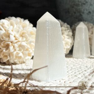 Shop Selenite White Crystal Obelisk available for online or in-store at Gaia Center crystal shop in Cyprus. Perfect for energy clearing, chakra healing & home decor. Islandwide delivery available.