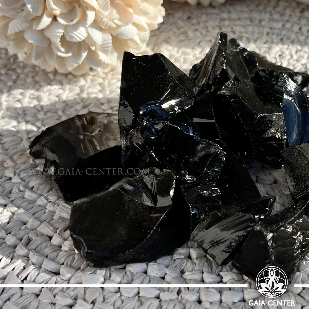 Black Obsidian rough natural crystal cluster – protection and grounding stone available at Gaia Center Cyprus.