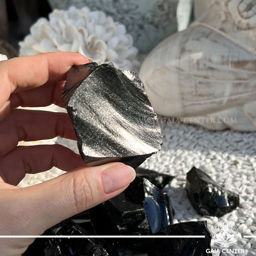 Black Obsidian rough natural crystal cluster – protection and grounding stone available at Gaia Center Cyprus.