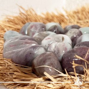 Natural Quartz with Pink Tourmaline crystal featuring soft pink inclusions for emotional healing and heart chakra energy.