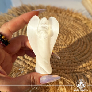 White Selenite Crystal Angel Mary carved from genuine natural selenite, available online at Gaia Center Crystal Shop Cyprus. Authentic Selenite Angel Mary for energy cleansing, peace, spiritual protection, meditation, clarity and spiritual wellbeing with Cyprus-wide delivery.