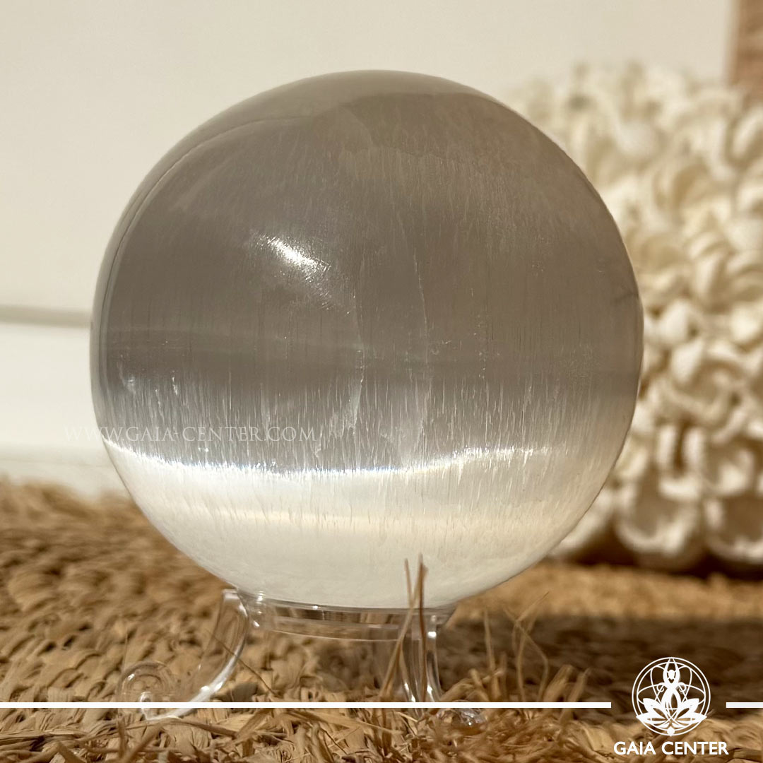 Selenite Crystal Sphere carved from genuine natural selenite, available online at Gaia Center Crystal Shop Cyprus. Authentic Selenite sphere for energy cleansing, mental clarity, meditation, spiritual protection and peaceful home décor with Cyprus-wide delivery.