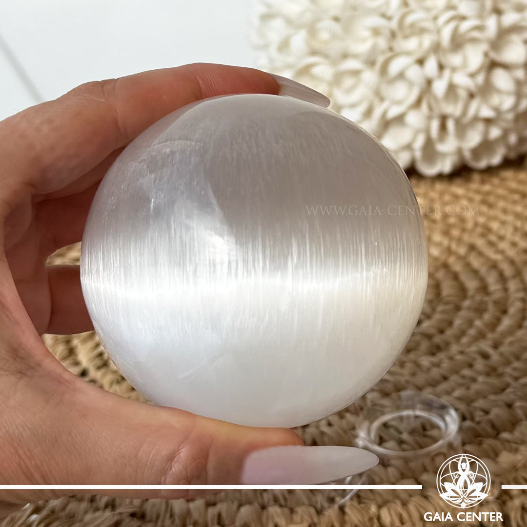 Selenite Crystal Sphere carved from genuine natural selenite, available online at Gaia Center Crystal Shop Cyprus. Authentic Selenite sphere for energy cleansing, mental clarity, meditation, spiritual protection and peaceful home décor with Cyprus-wide delivery.