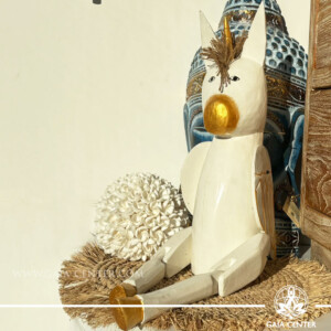 Hand-carved wooden unicorn from Bali, a mystical spiritual totem symbolising intuition, protection and inner strength.