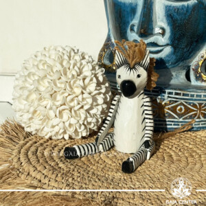 Hand-carved wooden zebra totem made in Bali, Indonesia, representing balance and individuality