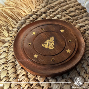 Incense Circular Holder Wood Round Ash Catcher - Buddha. Holds four aroma incense sticks and. Made from wood with artistic design. Incense burners selection at Gaia Center Crystal Incense Shop in Cyprus. Order online, Cyprus islandwide delivery: Limassol, Larnaca, Nicosia, Paphos. Europe and worldwide shipping.