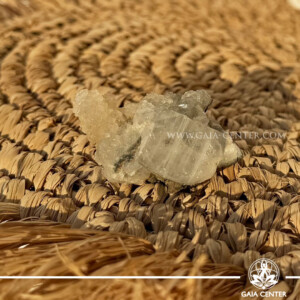 Natural green apophyllite crystal cluster with a stalactite druze formation, available at a crystal shop in Cyprus.