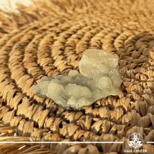Natural green apophyllite crystal cluster with a stalactite druze formation, available at a crystal shop in Cyprus.
