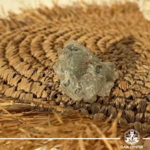 Natural green apophyllite crystal cluster with a stalactite druze formation, available at a crystal shop in Cyprus.