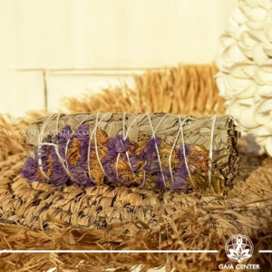 White Sage with Purple Sinuata Flowers Smudge Stick handcrafted from natural herbs and dried flowers, available online at Gaia Center Crystal Shop Cyprus. Ideal for energy cleansing, meditation, spiritual rituals, mindfulness and home wellness with Cyprus-wide delivery.