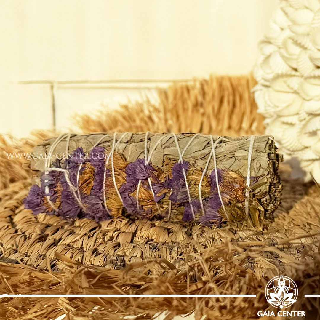 White Sage with Purple Sinuata Flowers Smudge Stick handcrafted from natural herbs and dried flowers, available online at Gaia Center Crystal Shop Cyprus. Ideal for energy cleansing, meditation, spiritual rituals, mindfulness and home wellness with Cyprus-wide delivery.